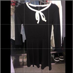 Black dress with white bow